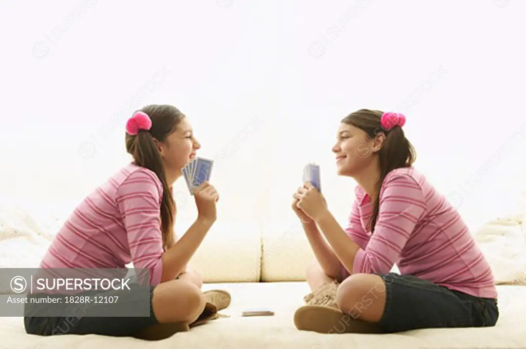 Twin Girls Playing Cards   
