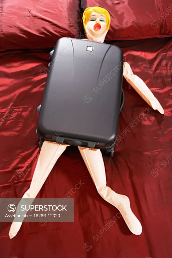 Blow-Up Doll in Suitcase   
