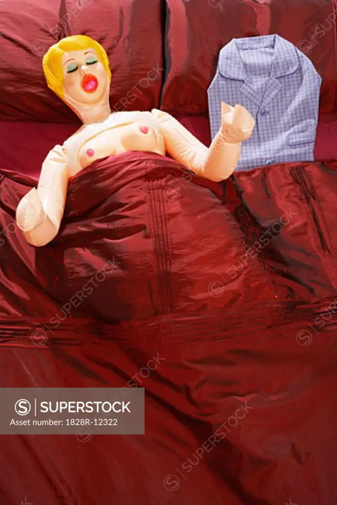 Blow-Up Doll in Bed   