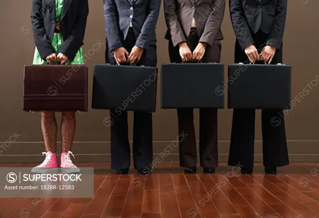 Businesswomen Holding Briefcases   