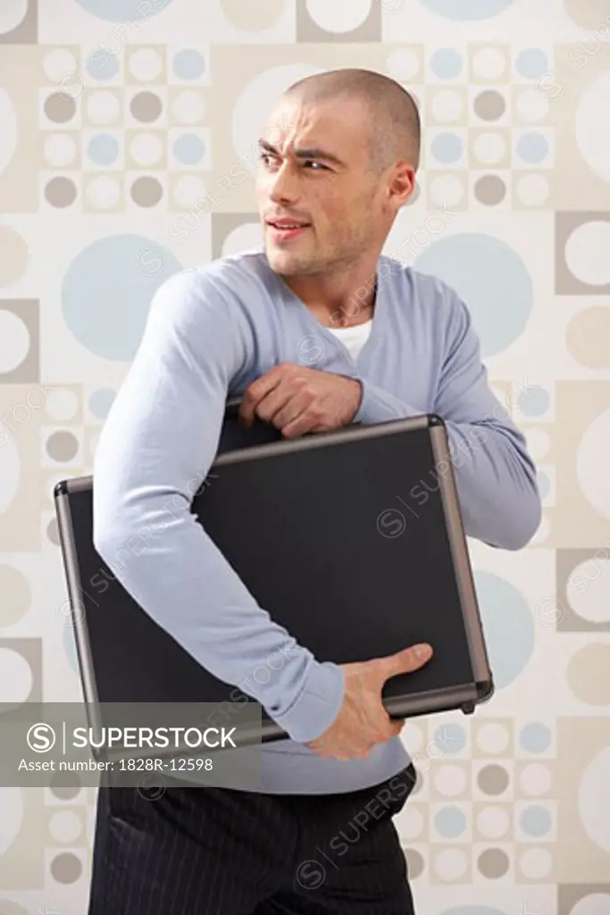 Man Carrying Briefcase   