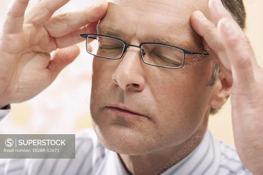 Man With Headache   