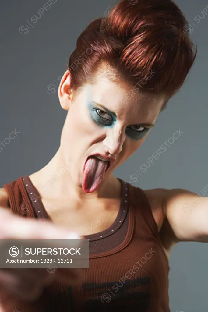 Portrait of Woman Sticking Out Tongue   