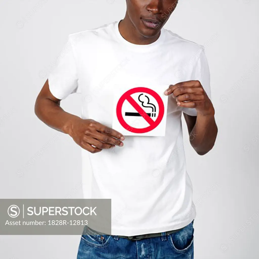 Man Holding No Smoking Sign   