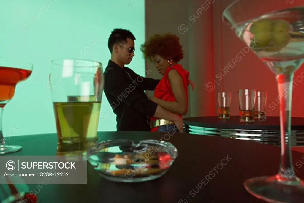 Couple Dancing at Bar   