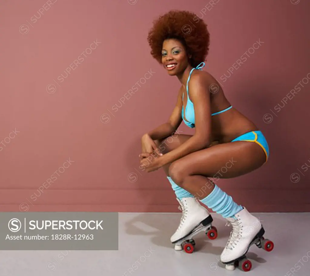 Portrait of Woman Wearing Roller-skates   