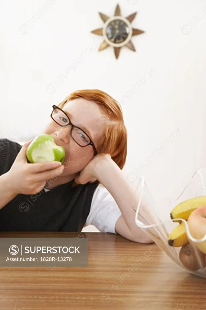 Boy Eating an Apple   