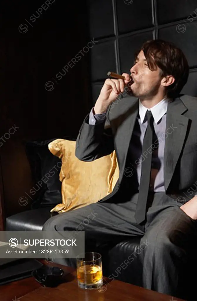 Man with Cigar and Liquor   