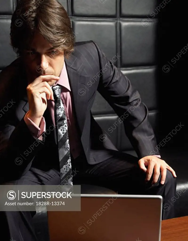 Businessman with Laptop Computer   