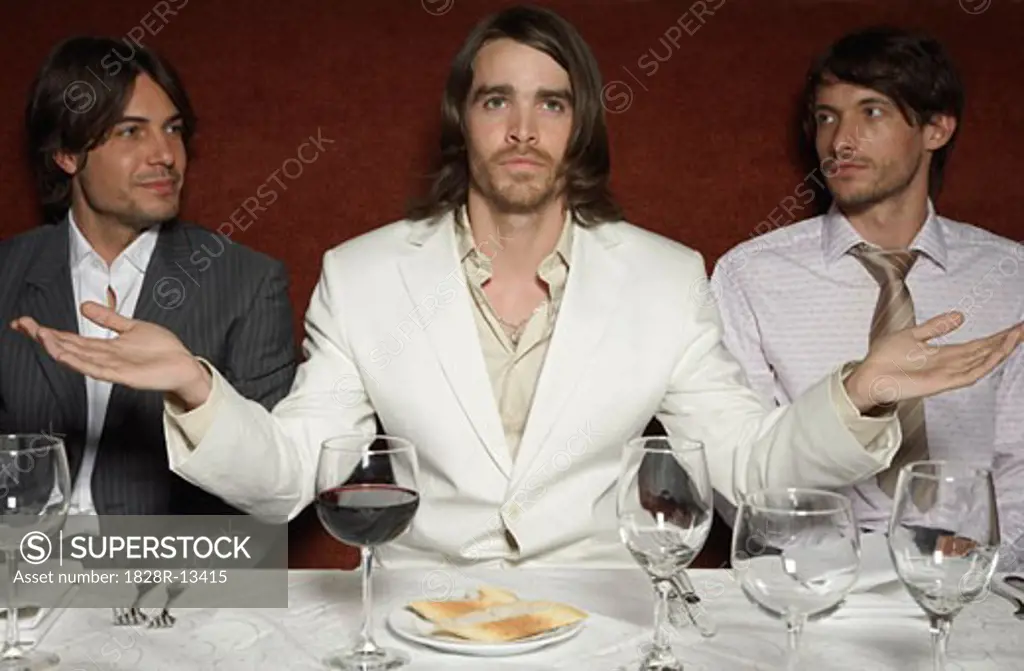 Businessmen in Last Supper Pose   