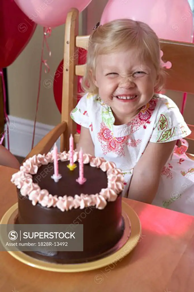 Girl with Birthday Cake   