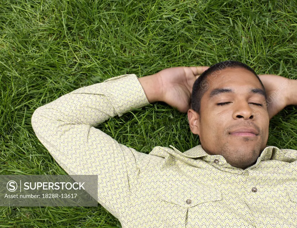 Man Lying on Grass   