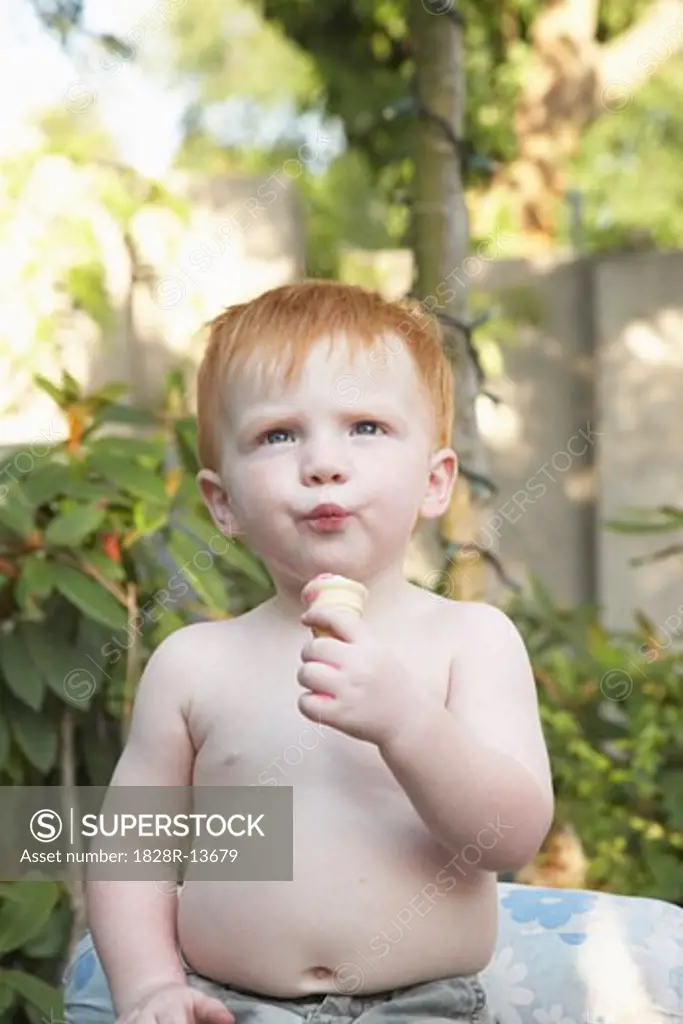 Toddler Eating Ice Cream Cone   