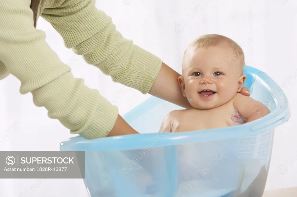 Baby Getting A Bath   