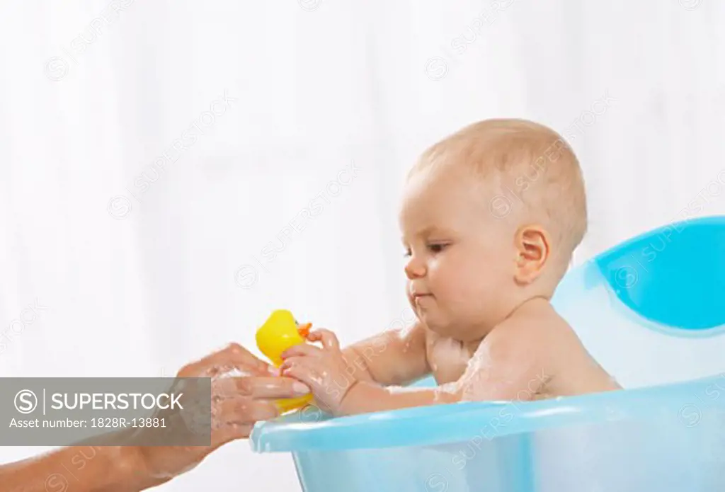 Baby Getting A Bath   