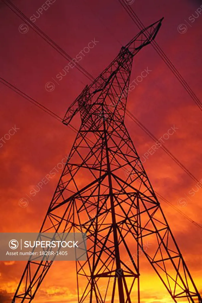 Silhouette of Power Lines and Transmission Tower at Sunset Alberta, Canada   