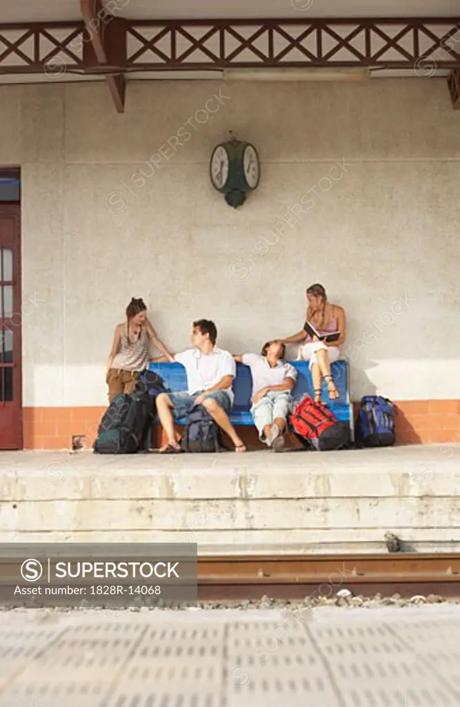 People Waiting at Train Station   
