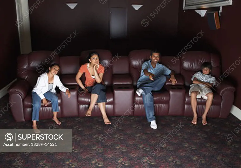 Family Watching Television   