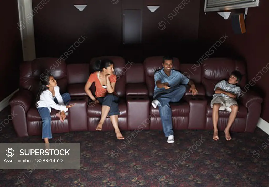 Family Watching Television   