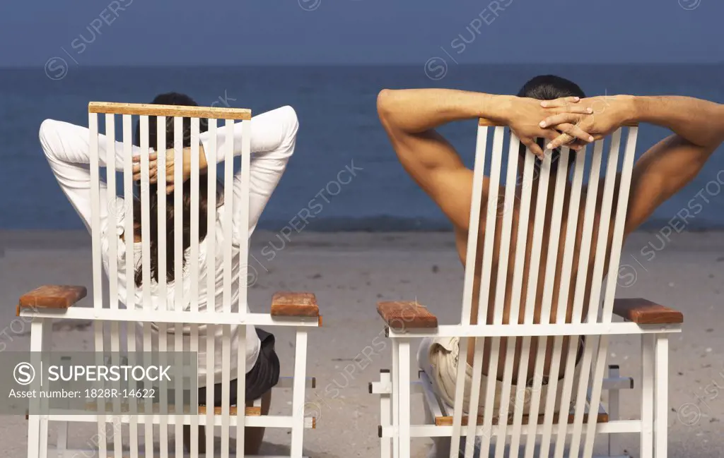 Couple Relaxing at Beach   