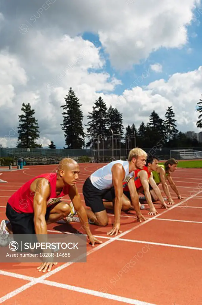 Men Lined up at Starting Blocks   