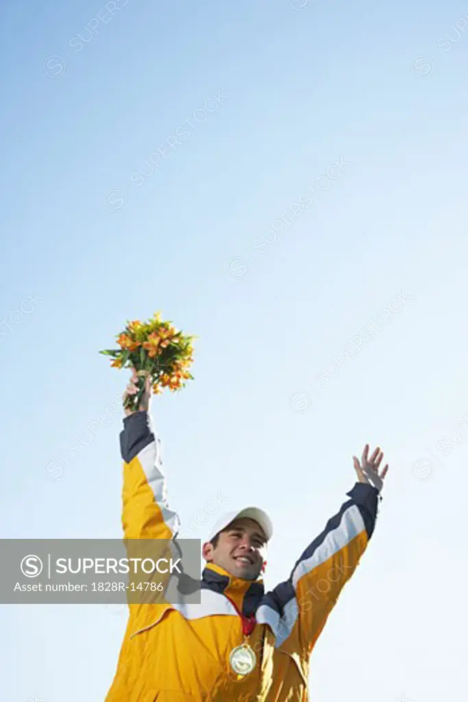 Man with Medal Holding Bouquet   