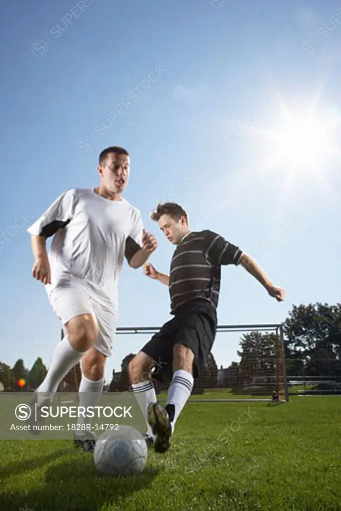 Men Playing Soccer   