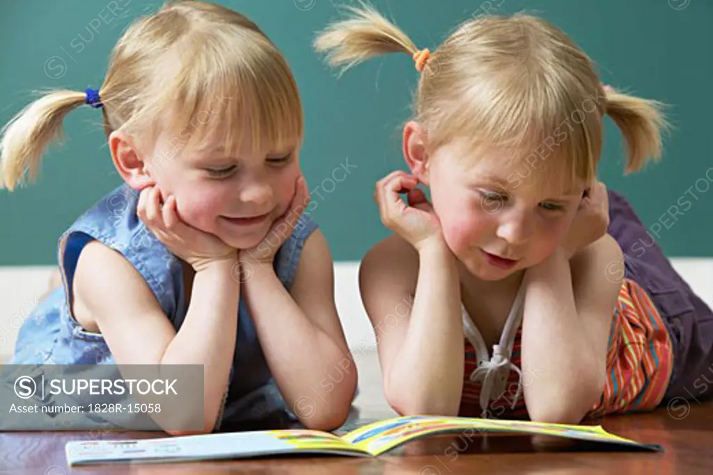 Twin Sisters Reading Book   