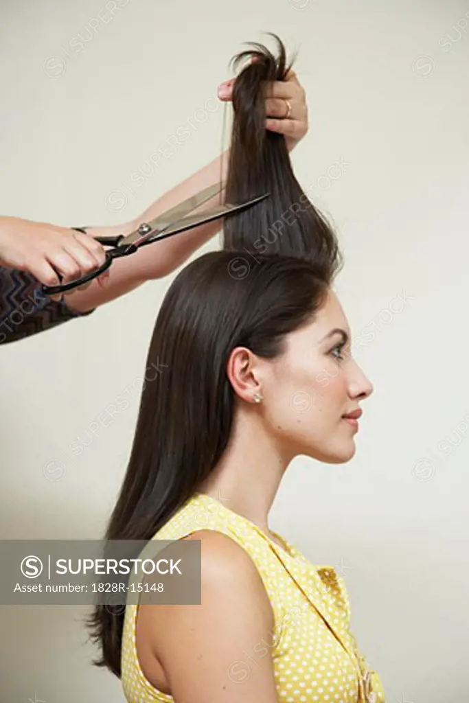 Woman Getting Haircut at Hair Salon   
