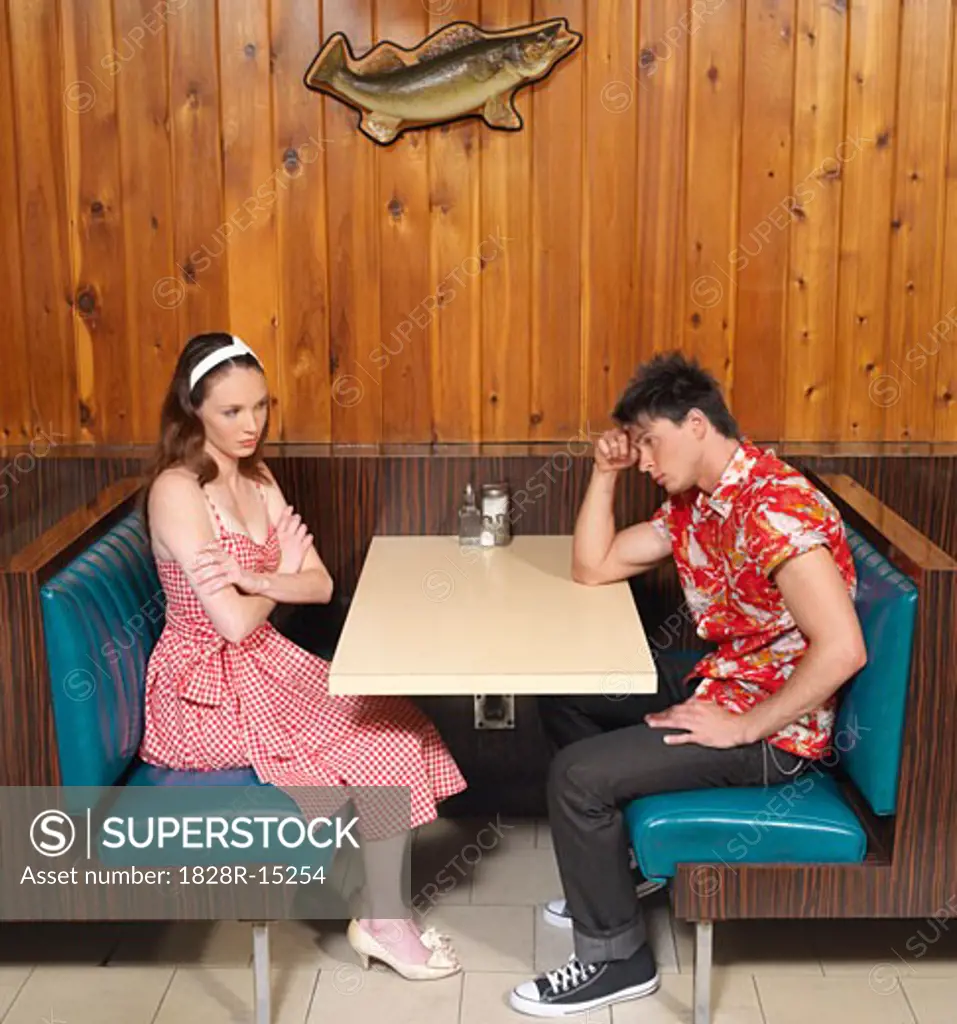 Couple Sitting in Diner   