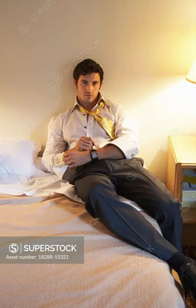 Portrait of Man on Bed   