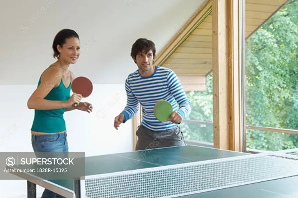 Couple Playing Ping Pong   