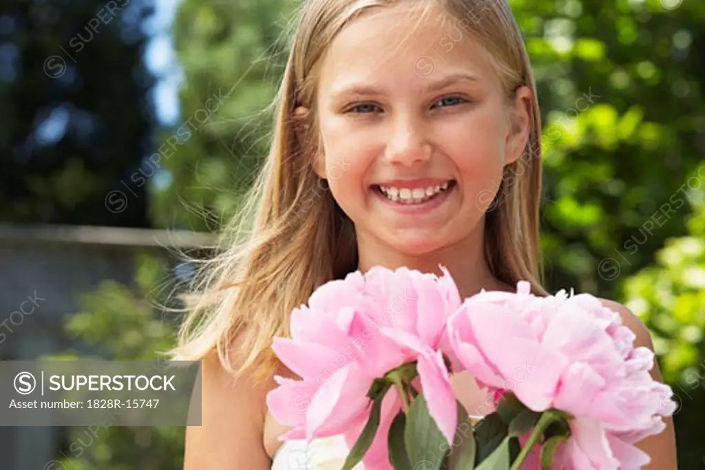 Portrait of Girl Holding Flowers   