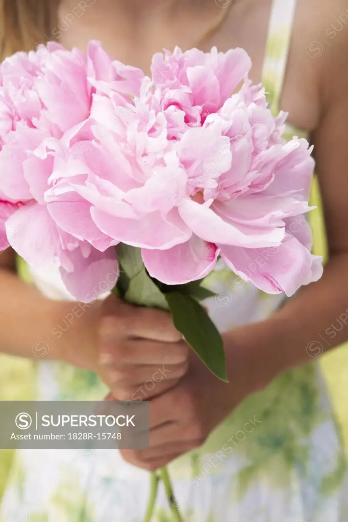 Close-up of Girl Holding Flowers   