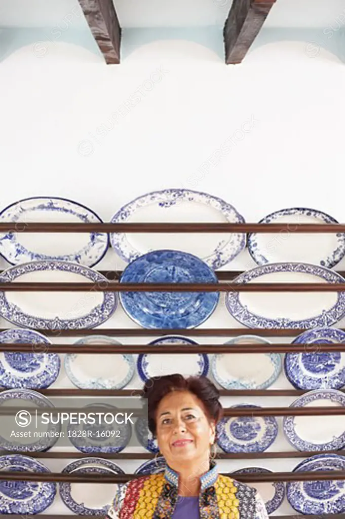 Woman by Plate Collection   