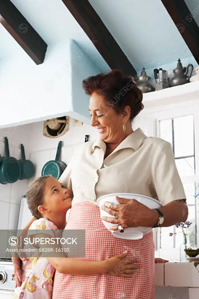 Grandmother and Granddaughter in Kitchen   