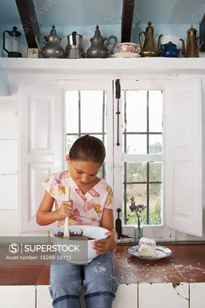 Girl with Mixing Bowl of Chocolate   