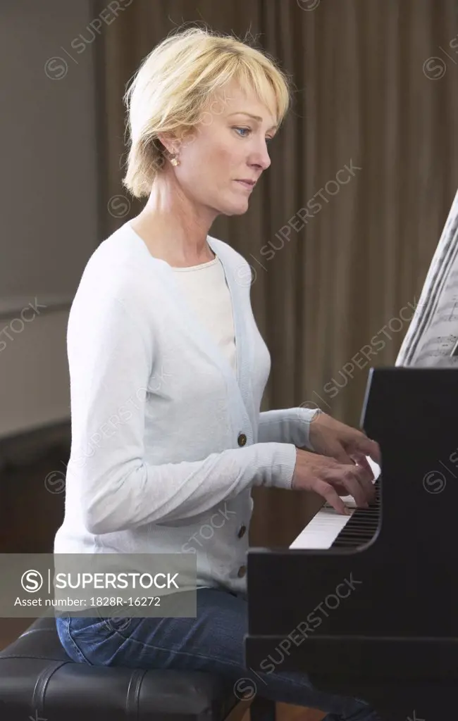 Woman Playing Piano   