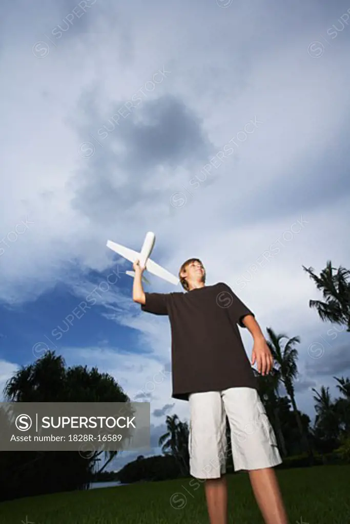 Boy Flying Model Airplane   