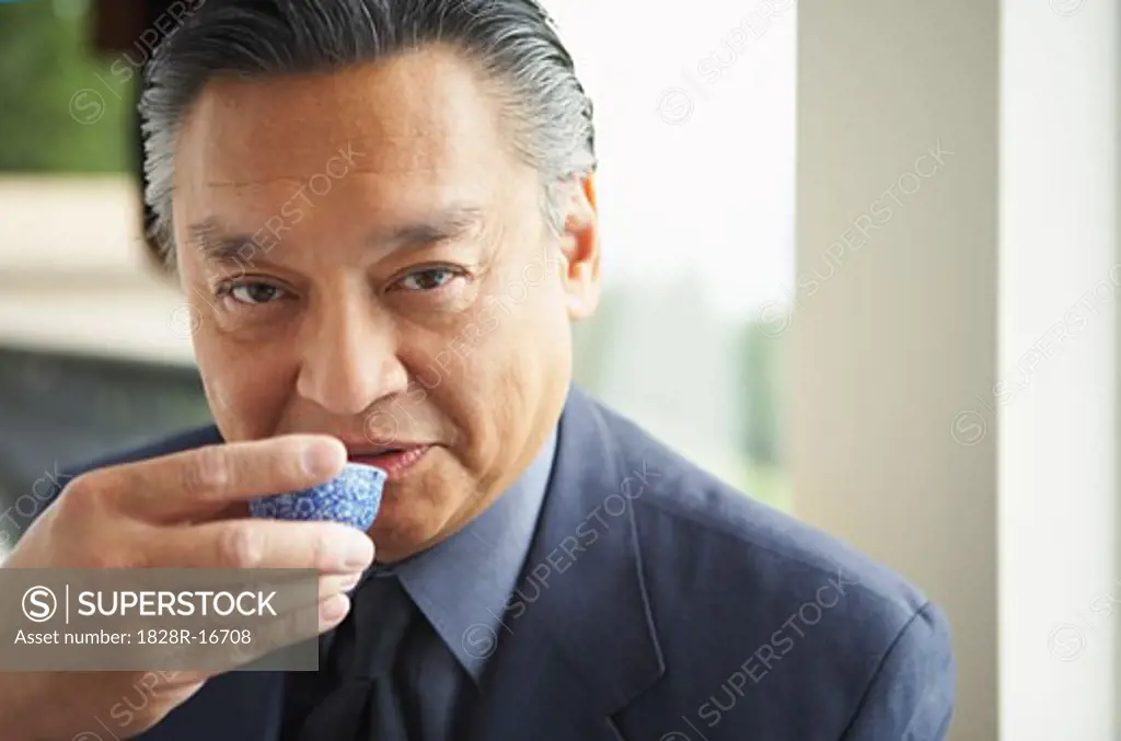 Portrait of Man Drinking Tea   