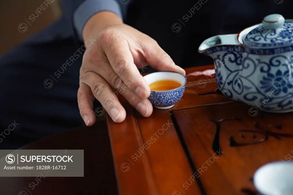 Man Holding Teacup   