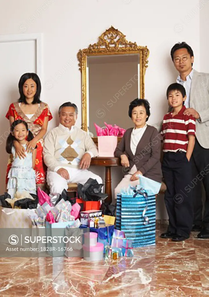 Portrait of Family with Shopping Bags   
