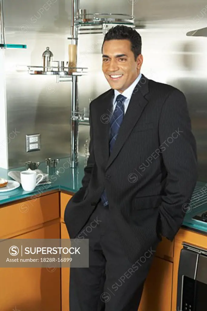Businessman in Kitchen   
