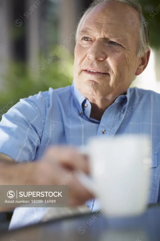 Portrait of Man Drinking Coffee   