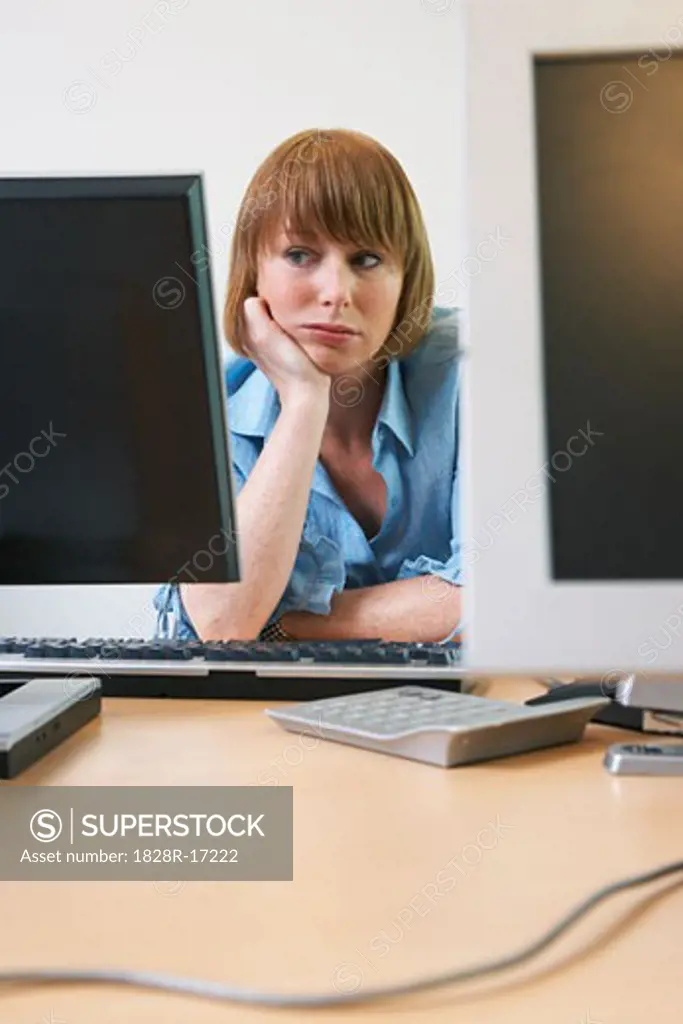 Woman Bored in Office   
