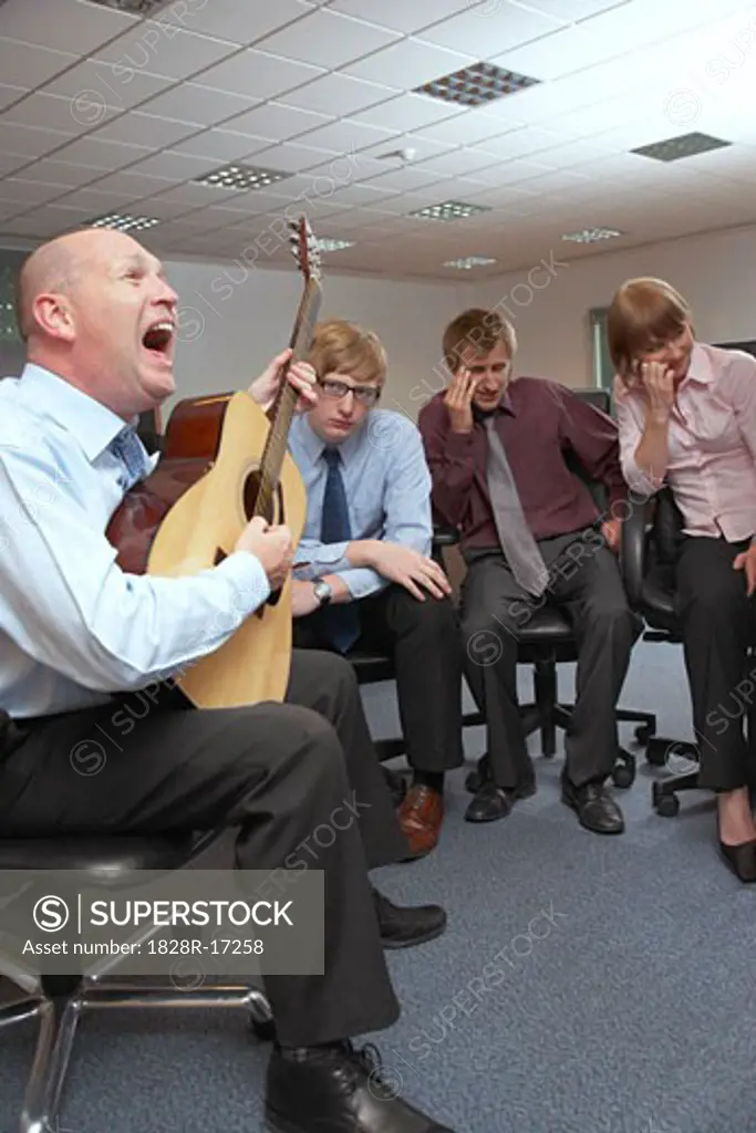 Manager Playing Guitar for Employees   