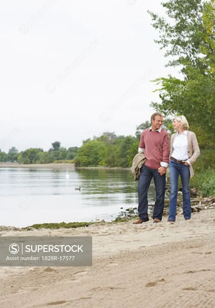 Couple Walking Outdoors, Sunnyside Park. Toronto, Ontario, Canada   