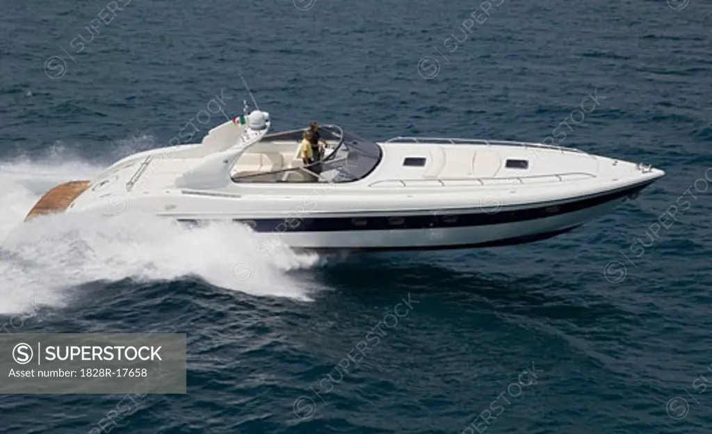 Men Riding in Speedboat