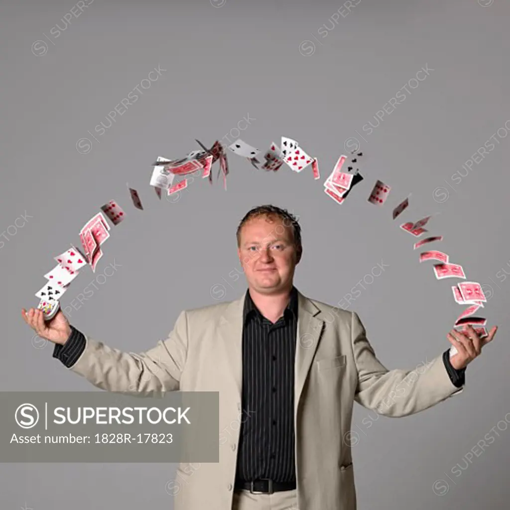 Man Juggling Playing Cards   
