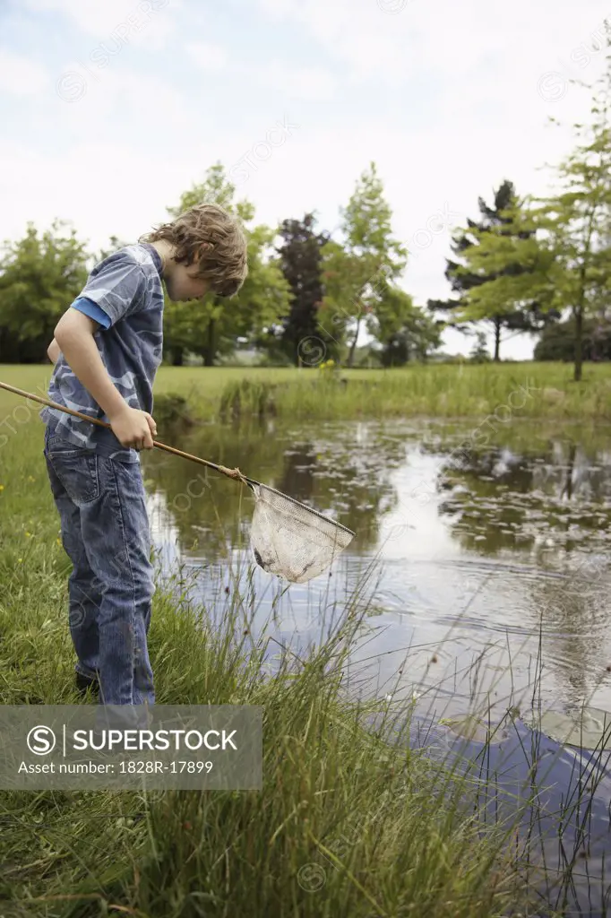 Boy Fishing in Pond   